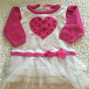 Long sleeve sweater dress with a heart